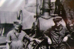 Fitting new tyres on a traction engine.