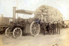 R S Sandell traction engine loading at the railway station.