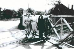 Trio at railway crossing