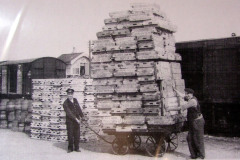 Loading fruit at the railway station.