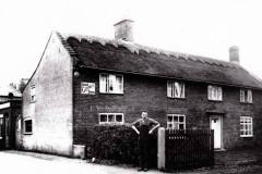 George Grimes shoe repairer, Repps Road. Converted to one house in 1988.