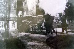 The traditional Parish Bier in use at a funeral at St Mary's.
